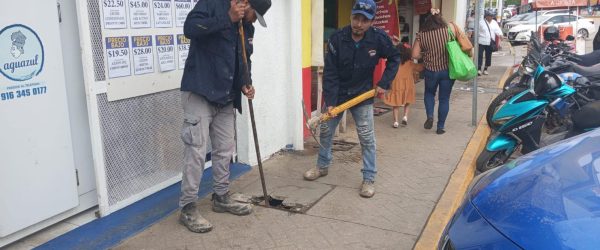 reparación de tapas de registro deterioradas en la calle 26